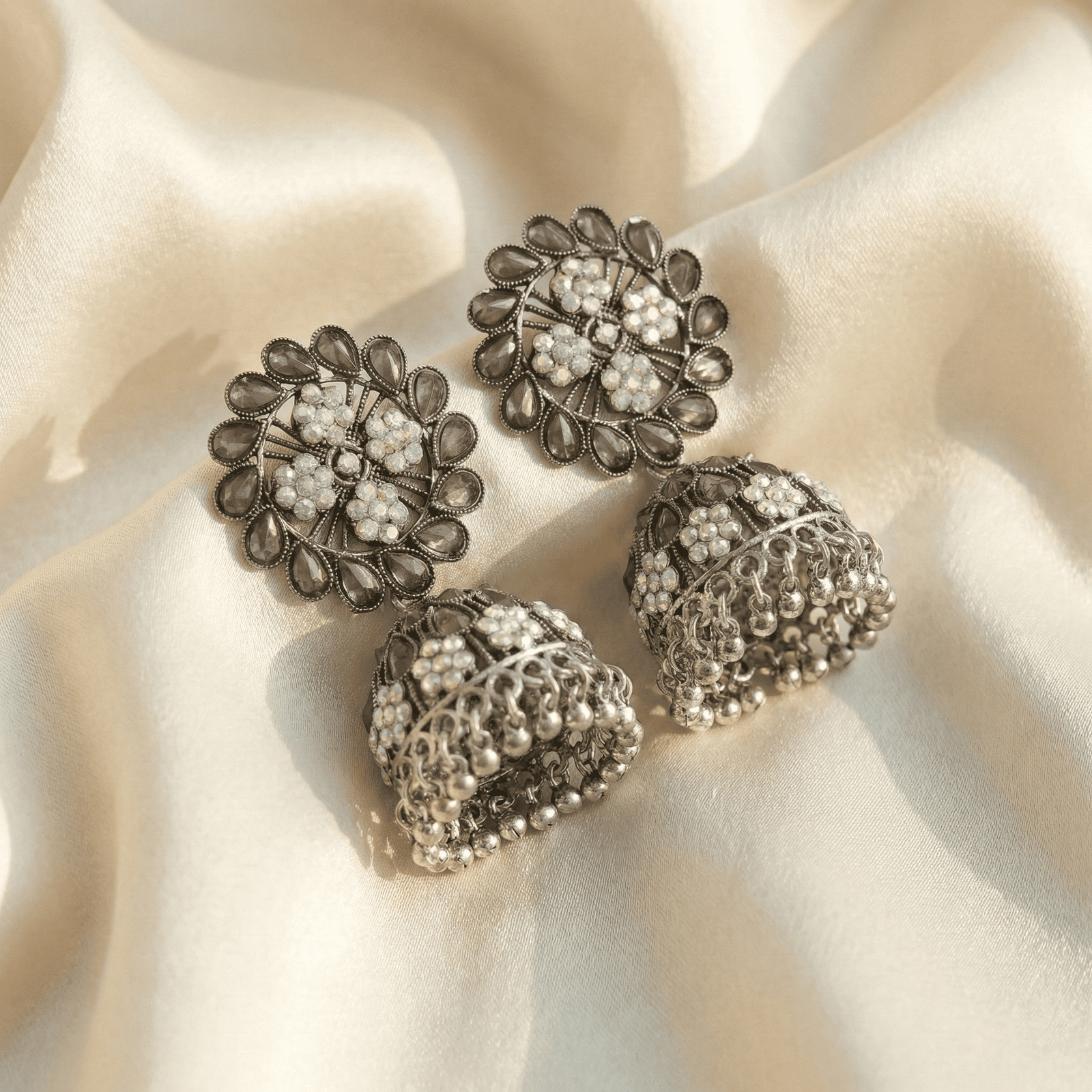 Oxidised Floral Jhumka Earrings with Clear Stones